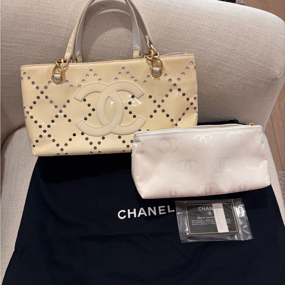 Authentic CHANEL natural white patent leather perforated mini tote with pouch